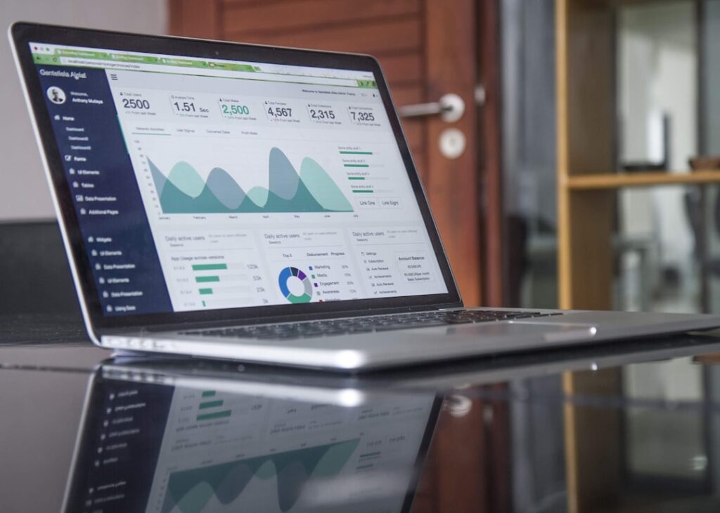 Laptop displaying website analytics charts for conversion optimisation